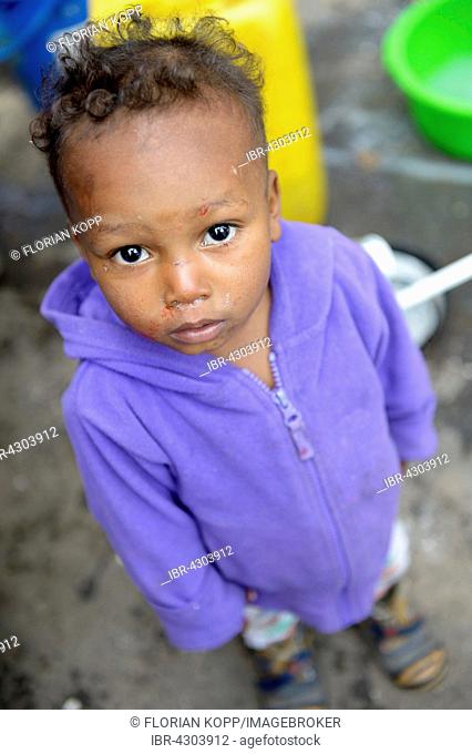 Boy, 2 years in a makeshift camp for civil war refugees, Barrio Bello Horizonte, Bogota, Colombia