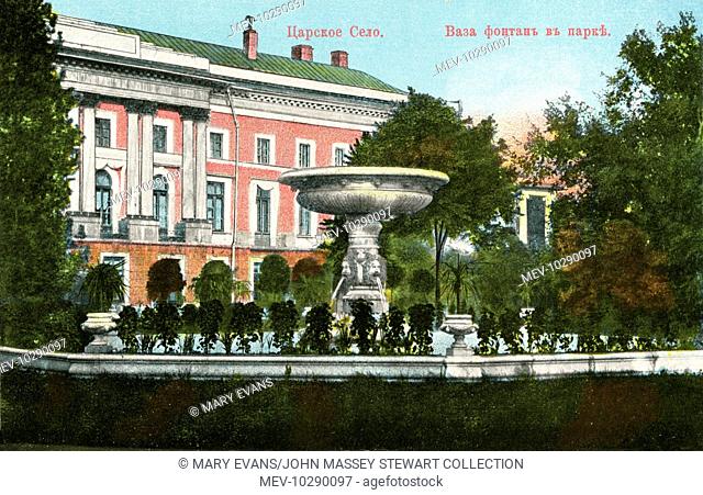 View of a fountain with a large central bowl in the grounds of Tsarskoye Selo, Russia. Tsarskoye Selo itself (meaning Tsar's Village or Royal Village) was a...
