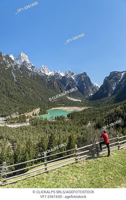 Dobbiaco/Toblach, Dolomites, South Tyrol, Italy. The lake Dobbiaco with the peaks of Croda dei Baranci and Croda Bagnata