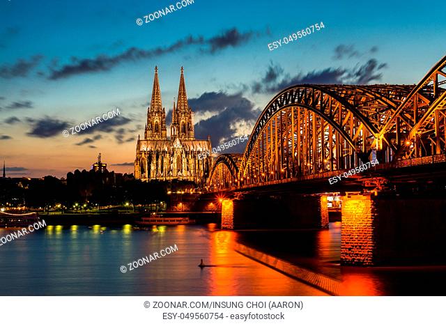 Cologne Cathedral and the Hohenzollern Bridge during the sunset hours