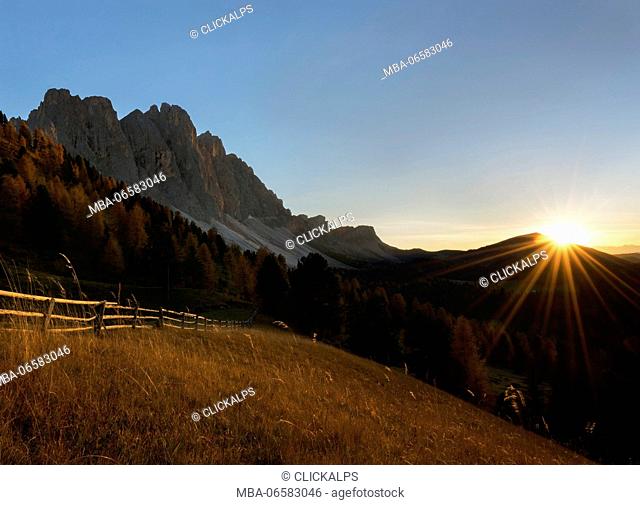Odle, Funes, Dolomites, Trentino alto Adige, Italy The Odle group taken at sunset in a field with a fence