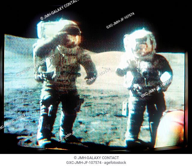 Astronauts Eugene A. Cernan (on left) and Harrison H. Schmitt pay their respects and send their best wishes to the members of the International Youth Science...