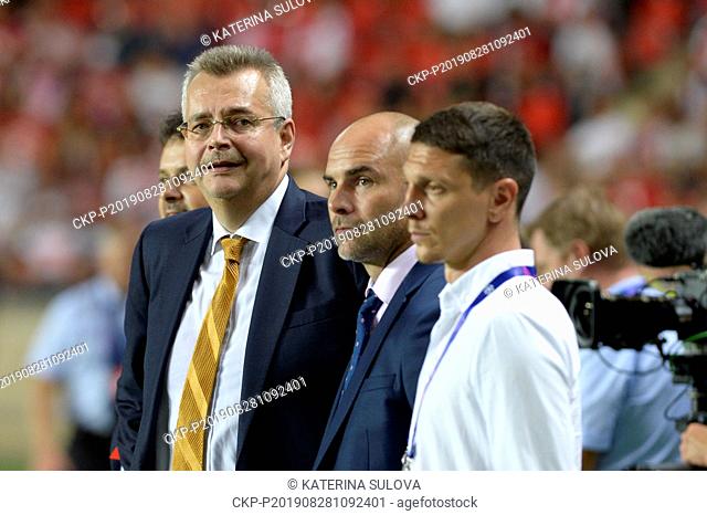 Chairman of the Board of SK Slavia Praha Jaroslav Tvrdik , left, speaks with Jan Nezmar, centre, director of SK Slavia Praha during the Football Champions'...