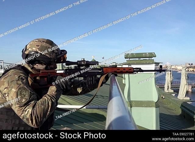 RUSSIA, ST PETERSBURG - MAY 12, 2023: A member of an anti-drone squad of the Russian police is on duty in St Petersburg on Victory Day