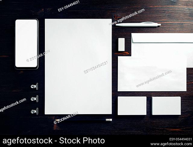 Corporate identity template. Photo of blank stationery set on wooden background. Mockup for design presentations and portfolios. Flat lay