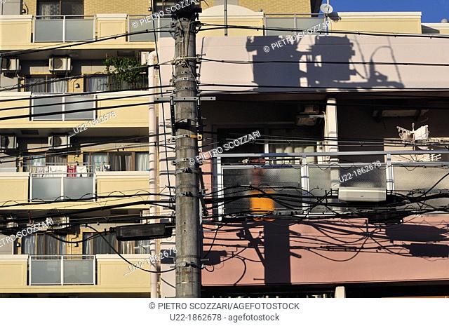 Naha, Okinawa, Japan, electric poles too near to apartments
