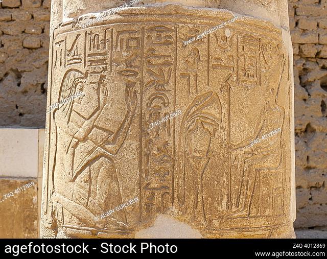 Egypt, Saqqara, tomb of Horemheb, reliefs on columns in the second court : Horemheb praying Atum and Nefertum (not visible)