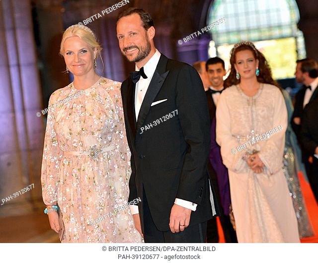 Crown Prince Haakon of Norway and Princess Mette-Marit arrive for a dinner at the occasion of the abdication of Dutch Queen Beatrix and the investiture of...