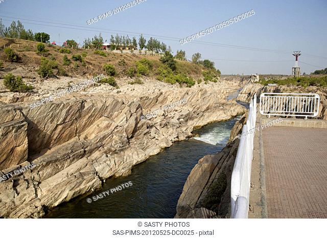 Narmada River flowing through a gorge of Marble rocks, Bhedaghat, Jabalpur District, Madhya Pradesh, India