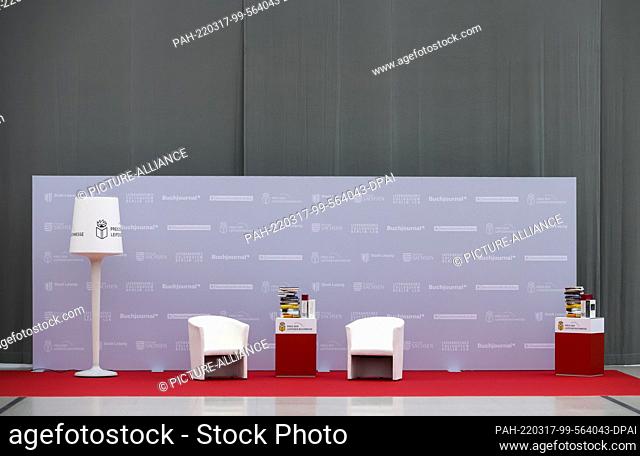 17 March 2022, Saxony, Leipzig: Two armchairs and a book table stand on the sidelines of the award ceremony for the Leipzig Book Fair 2022 Prize in the Glass...