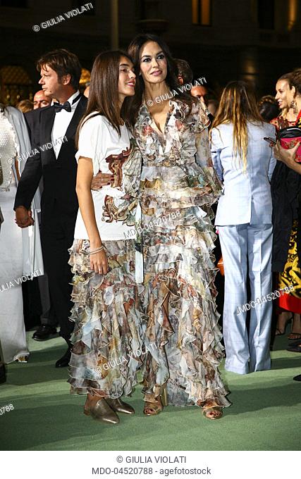 Italian actress Maria Grazia Cucinotta with her daughter Giulia Violati attend the Green Carpet Fashion Awards at Piazza della Scala during the Milano Fashion...