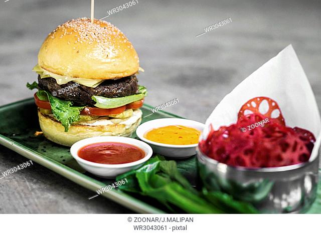 beef burger set with lotus chips and sauces