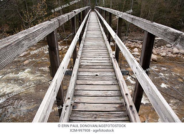 Pemigewasset Wilderness - Suspension bridge on the Wilderness Trail which spans the East Branch of the Pemigewasset River in Lincoln, New Hampshire USA