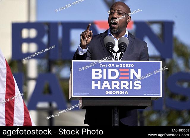 Reverend Raphael Warnock adresses drive-in rally on election eve to get out the vote for Joe Biden, Jon Ossoff and Raphael Warnock on November 2