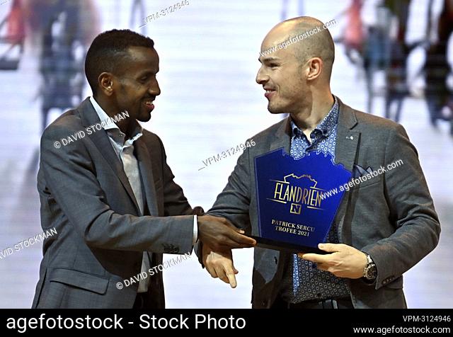 Bashir Abdi and Tim Celen, winner of the Patrick Sercu trophy pictured during the 'Flandrien' award ceremony for the best Belgian cyclist of the 2021 cycling...