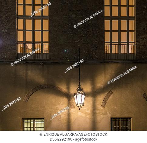 Lamp in a wall at night, Torino, Italy