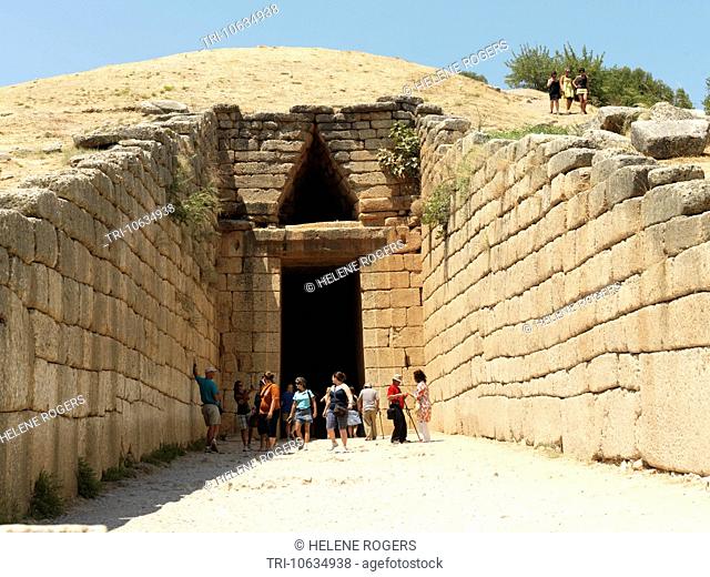 Mycenae Peloponnese Greece Tourists At The Entrance Of Tholos Tomb Treasury of Atreus