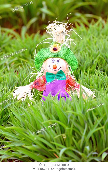 Garden decoration, little man made of fabric and bast fibres