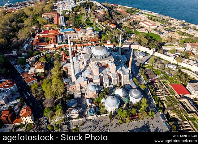 Turkiye, Istanbul, Aerial view of Sultanahmet district with Hagia Sophia mosque in center