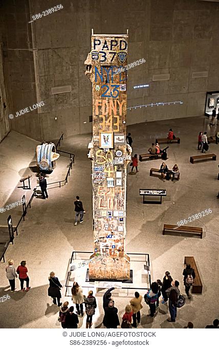 People viewing ""The Last Column"" at the 9/11, Sept. 11th Museum In Downtown Manhattan, New York City. The Column was thefinal one remaining from the old...