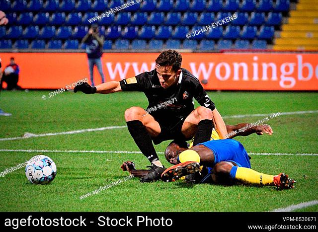 Deinze's Gaetan Hendrickx and Westerlo's Igor Vetokele fight for the ball during a soccer match between KVC Westerlo and KMSK Deinze