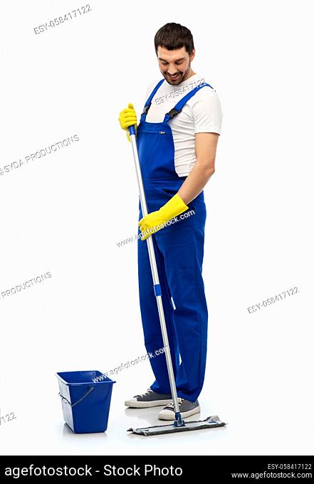 male cleaner cleaning floor with mop and bucket