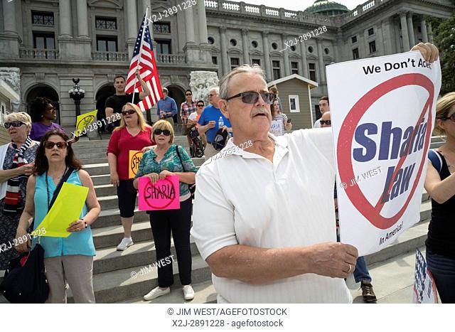Harrisburg, Pennsylvania USA - 10 June 2017 - About 50 members of ACT for America rallied on the steps of the Pennsylvania state capitol against Sharia law