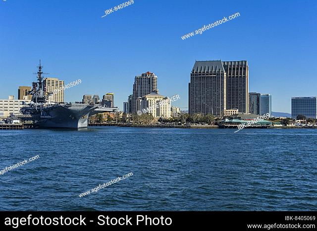 Skyline of San Diego with the USS Midway, California, USA, North America