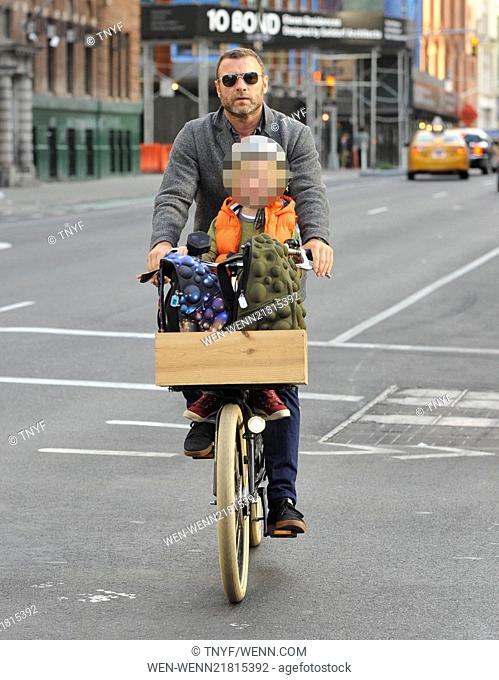 Liev Schreiber rides his two sons, Samuel and Alexander, to school while his partner, Naomi Watts walks alongside before eventually joining the trio on their...