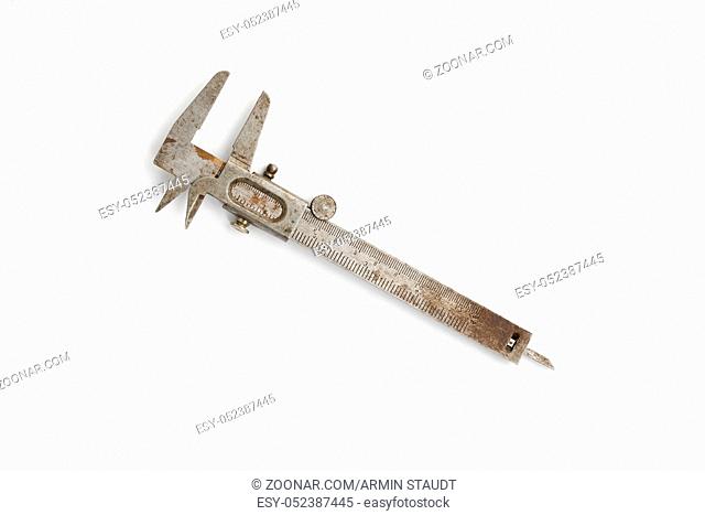 old and rusty vernier caliper isolated on white