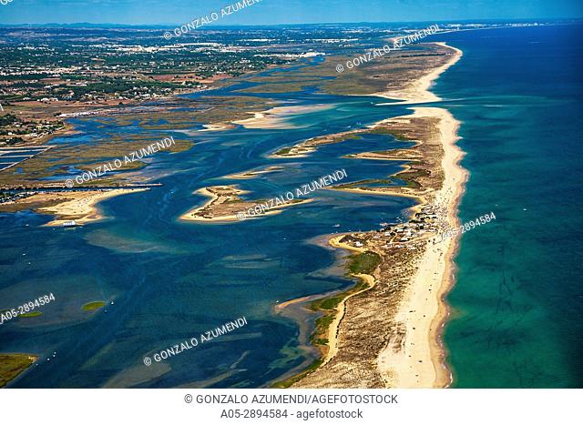 Fuzeta beach and island. In the background Fuzeta. Ria Formosa, natural park. Faro district. Algarve. Portugal