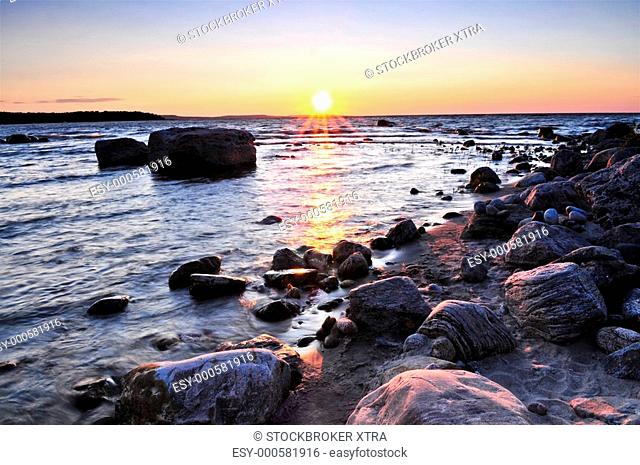 Sunset at the rocky shore of Georgian Bay, Canada. Awenda provincial park