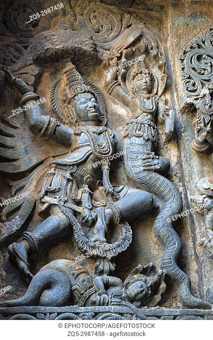 Garuda fights a pair of snakes. Hoysalesvara Temple, Halebid, Karnataka, 12th Century. Shiva temple