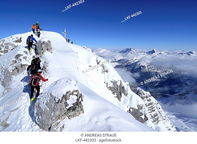 Serveral people ascending Birnhorn summit, Berchtesgaden range in the background, Birnhorn, Leoganger Steinberge range, Salzburg, Austria