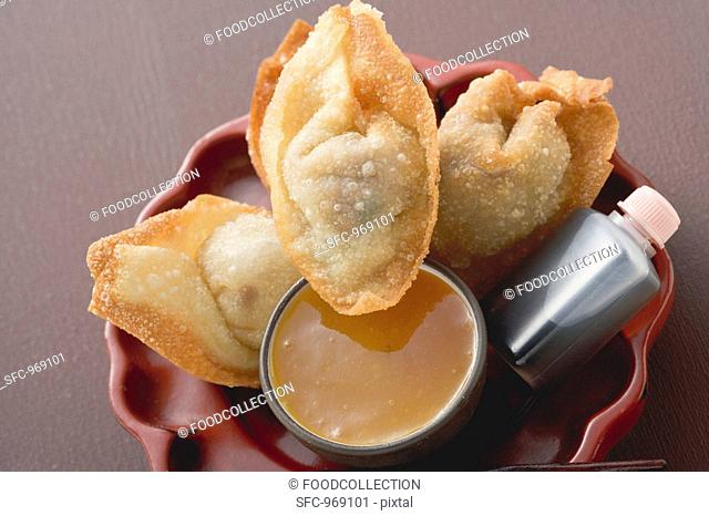 Deep-fried dim sum with two sauces Asia