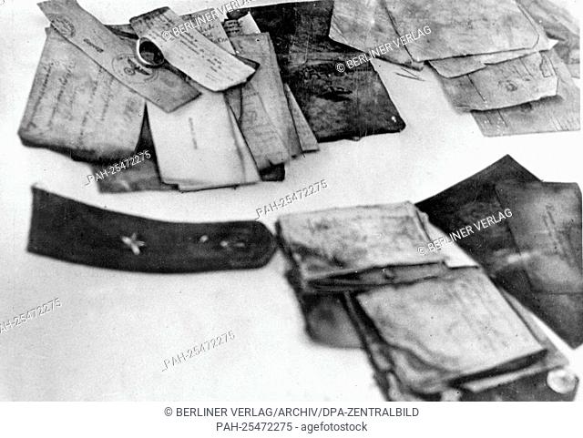 The discovery of the mass graves in Katyn (Russia) by the German Wehrmacht in February 1943 - the Nazi Propaganda! on the back of the iamge is dated 16 March...