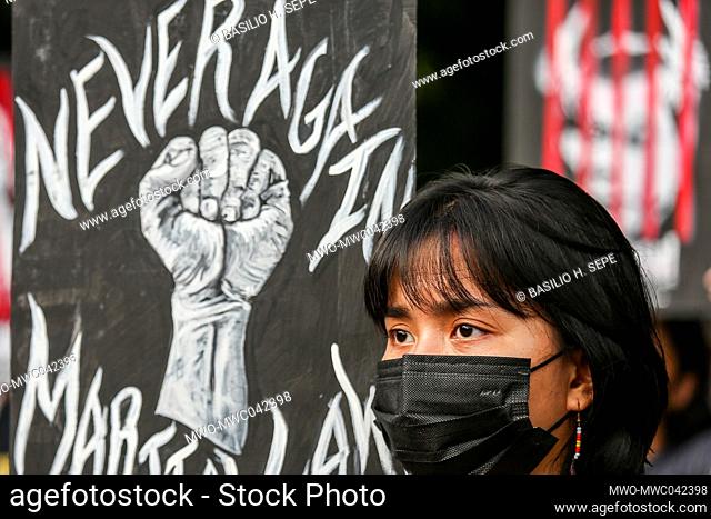 Manila, Philippines. September 21st 2021. Filipino activists hold signs during a protest march to commemorate the anniversary of the 1972 martial law
