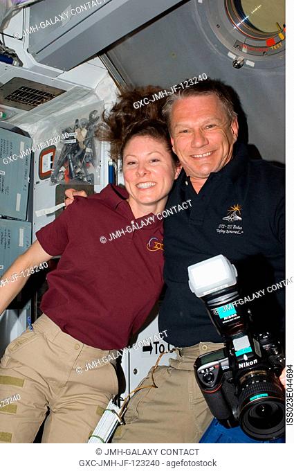 Soon after initial hatch opening, NASA astronauts Tracy Caldwell Dyson, Expedition 23 flight engineer; and Piers Sellers, STS-132 mission specialist