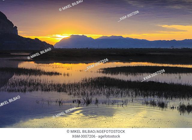 Salt marshes at dusk. Cerroja water mill. Santoña, Victoria and Joyel Marshes Natural Park. Cantabria, Spain, Europe