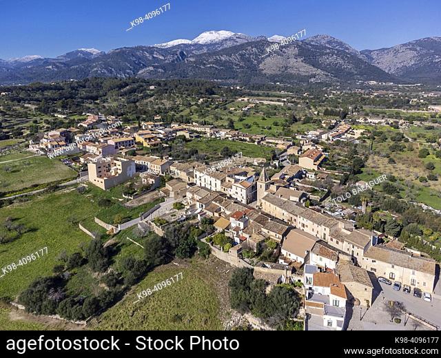 Moscari village with the snowy Tramuntana mountains in the background, Selva, Majorca, Balearic Islands, Spain