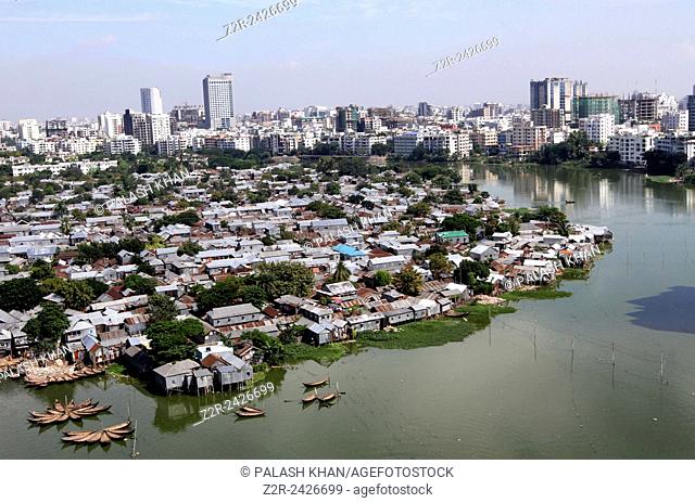 Arial view of korail slum besides the high-rich buildings at Gulshan in Dhaka on 24 October 2013. . Bangladesh, one of the poorest nations on the planet, has 3