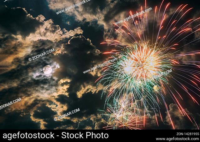 Colorful amazing fireworks with the full moon in fireworks festival, Independence day, New Year