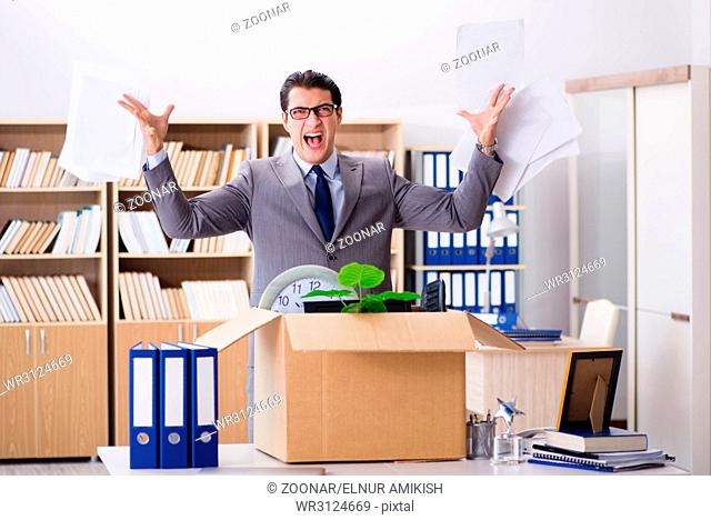 The young businessman moving offices after being made redundant