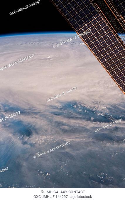 Tropical Cyclone Debbie as photographed by crewmembers aboard the International Space Station on March 27, 2017. The large storm made landfall across the...