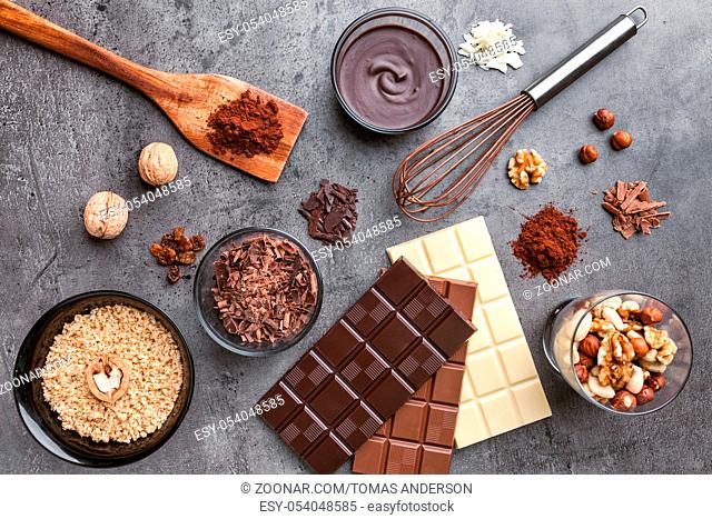 Delicious and sweet variety of chocole on rustic background