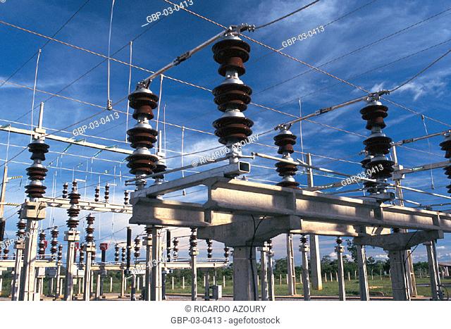Photo illustrated a power distribution station, towers, wires, cables, power
