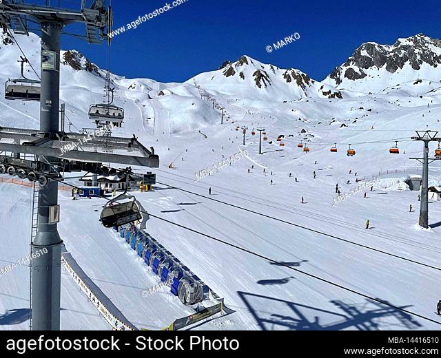 Skiing area Silvretta Ski Arena Samnaun/Ischgl, view of Alp Trida, snowy mountains, Ischgl, Paznaun valley, winter, nature, mountains, blue sky, Samnaun