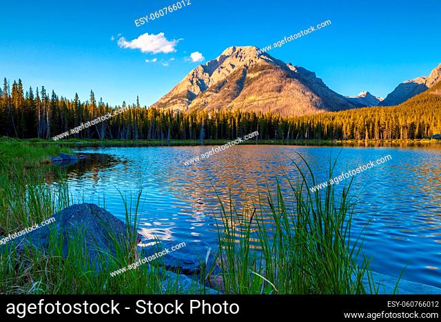 Buller Mountain in Spray Valley Provincial Park, Kananaskis, Alberta, Canada reflecting in Buller Pond