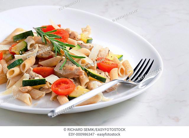 pasta penne with turkey meat and vegetables