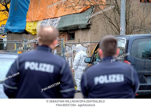 Police securing a premises where a corpse has been found in Leipzig, Germany, 28 February 2017. According to media reports